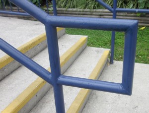 Compliant stair handrail