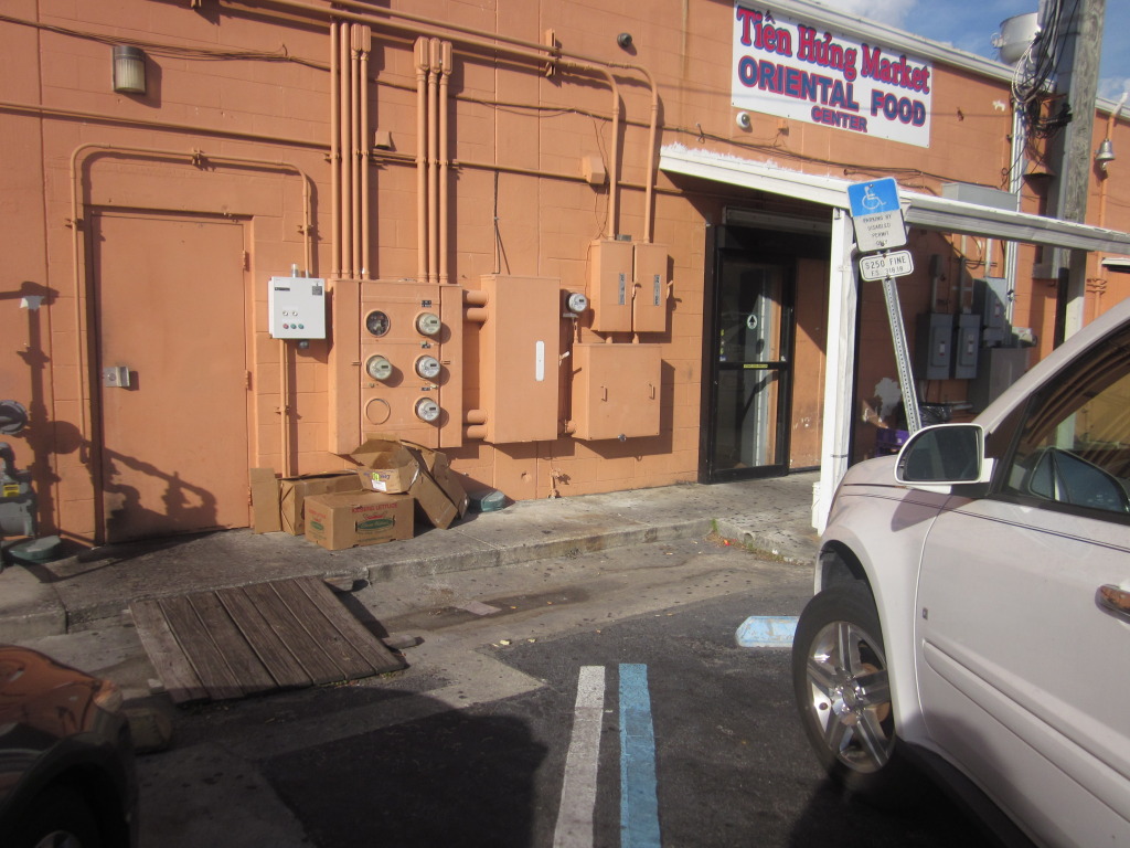 The only ramp near the Handicap parking space. A broken concrete ramp was furhter down and blocked by a concrete curb and standard parking space. This is in Downtown Orlando on Colonial Drive. You would think that someone would care!